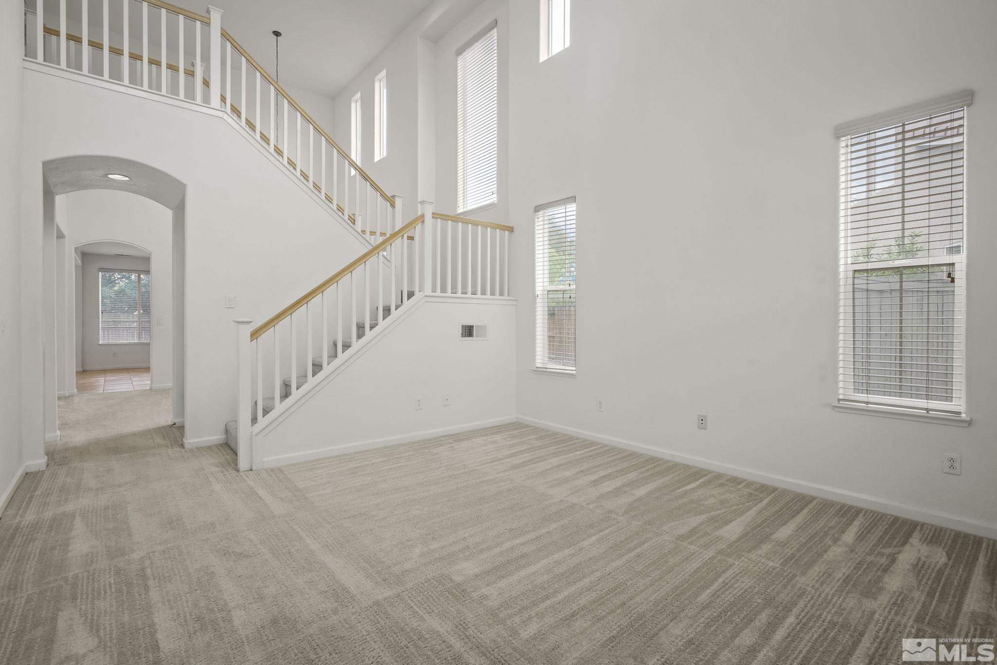 1722 Back Country Court Reno, NV 89521 - Photo 4 of 33 a view of staircase with white walls and windows