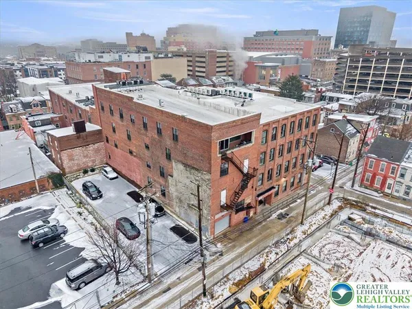a large building with a view of city