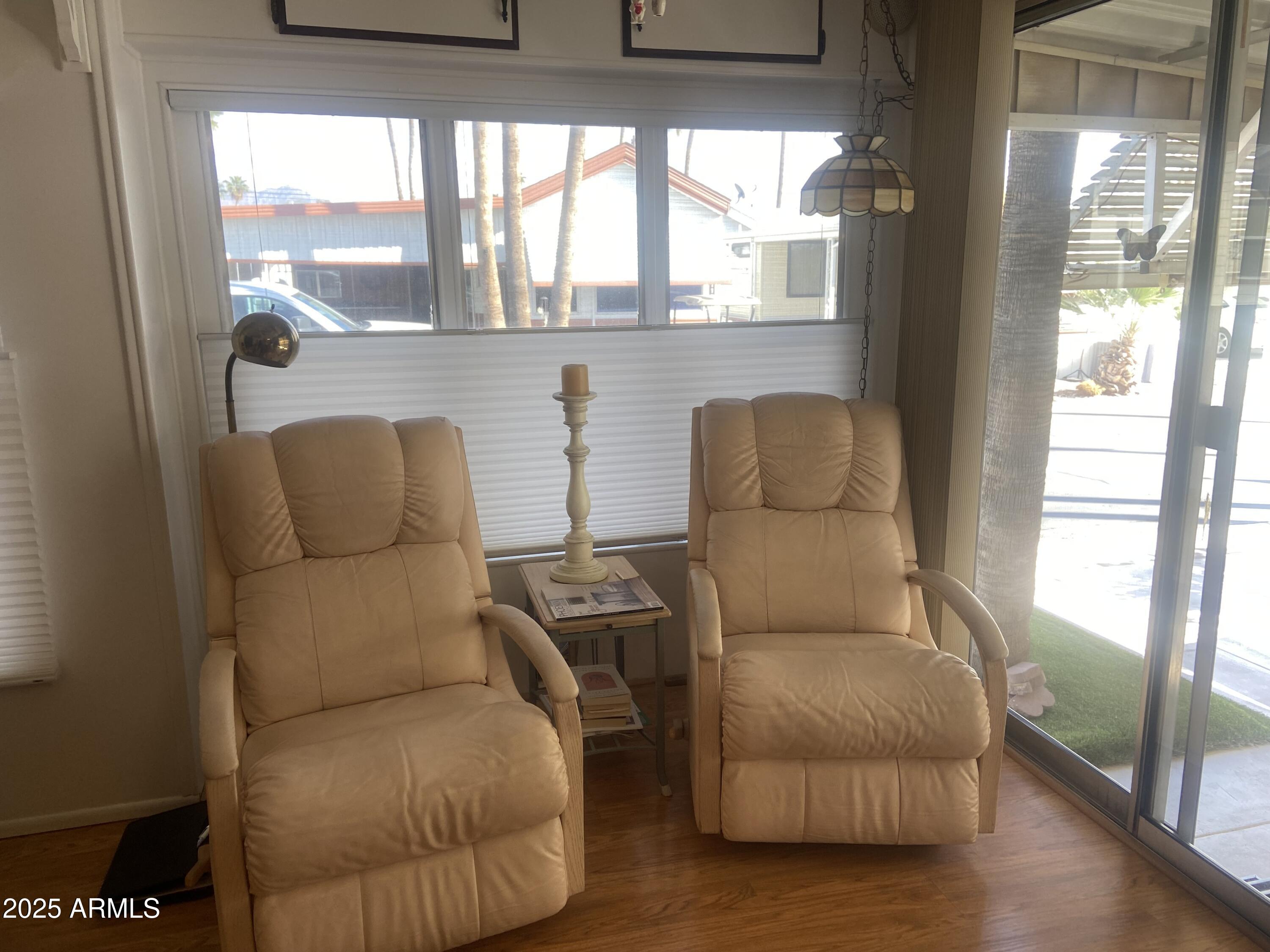 1135 South Sioux Drive Apache Junction, AZ 85119 - Photo 4 of 33 a living room with furniture and a window