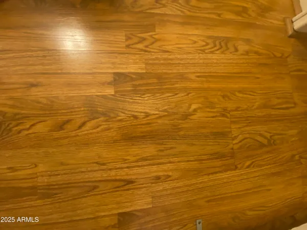 a kitchen with stainless steel appliances a stove a sink and a microwave