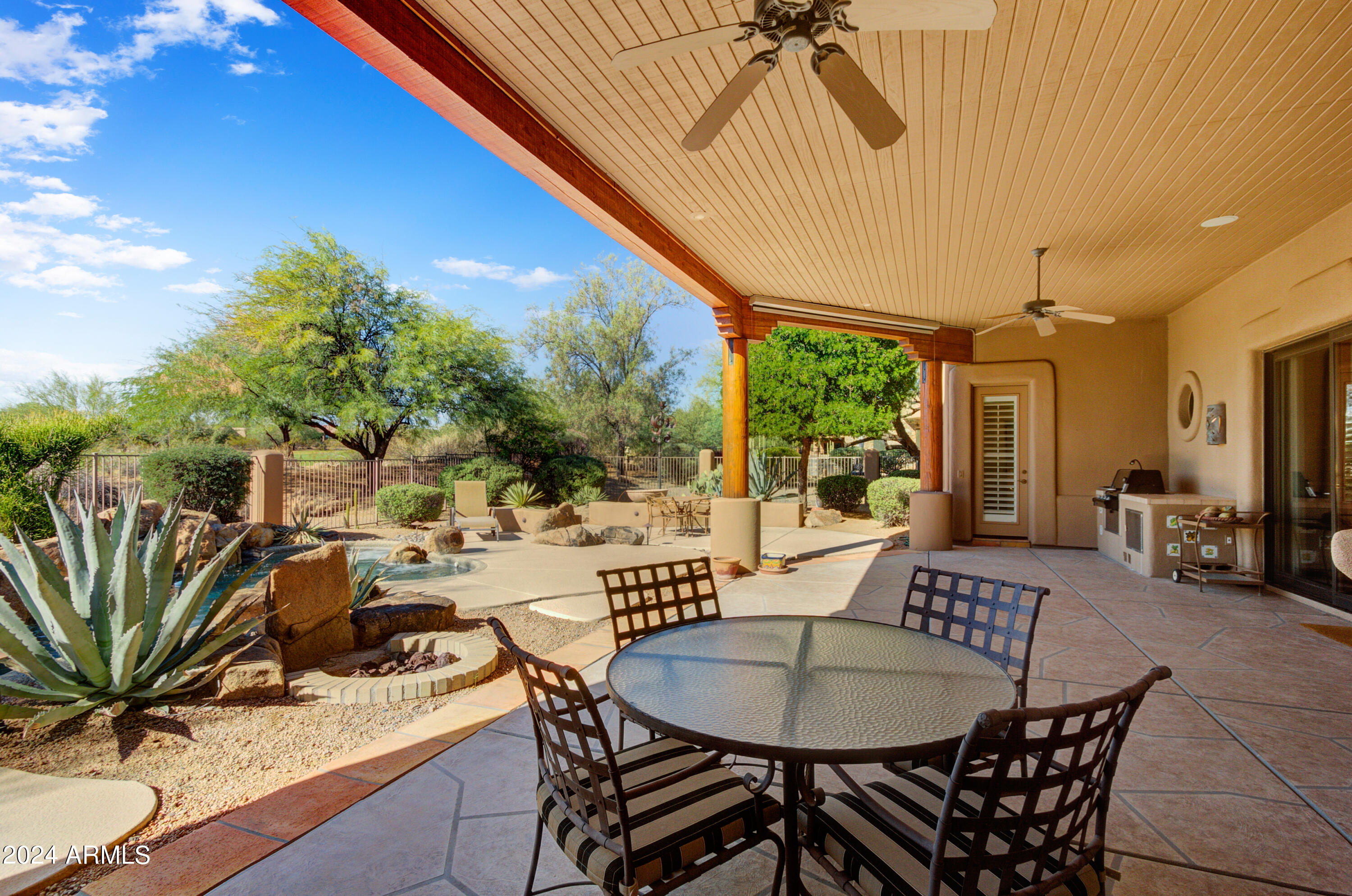 27820 North Lucero Drive Rio Verde, AZ 85263 - Photo 24 of 32 a view of a dining room with furniture window and outside view