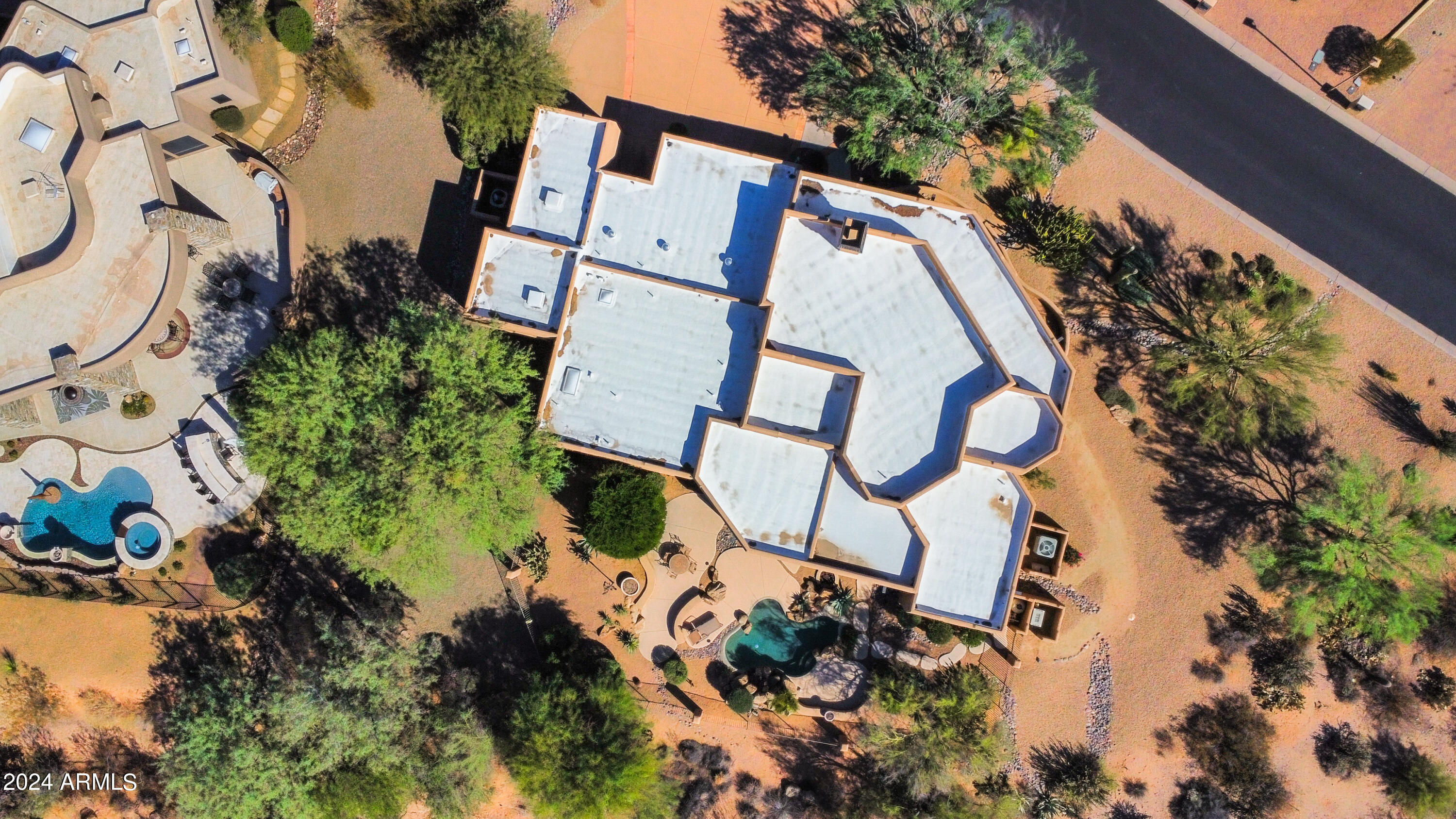 27820 North Lucero Drive Rio Verde, AZ 85263 - Photo 32 of 32 an aerial view of a house with a yard and garden