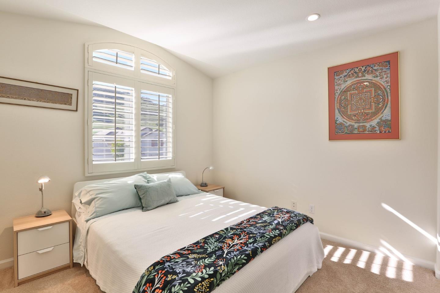 5409 Manderston Drive San Jose, CA 95138 - Photo 14 of 40 a bedroom with a bed and a painting on the wall