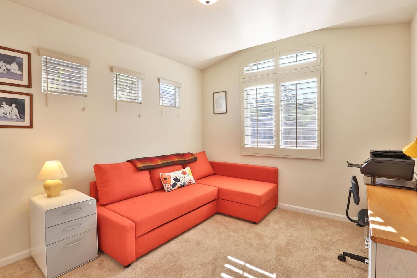 5409 Manderston Drive San Jose, CA 95138 - Photo 15 of 40 a blue room with a couch and a window