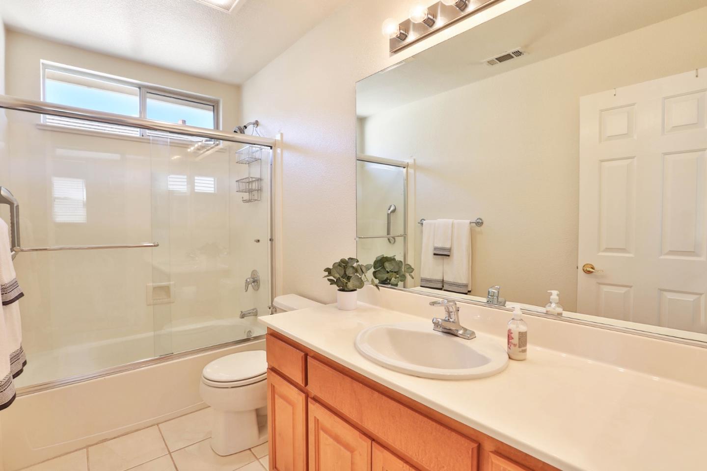 5409 Manderston Drive San Jose, CA 95138 - Photo 16 of 40 a bathroom with a sink a toilet and shower