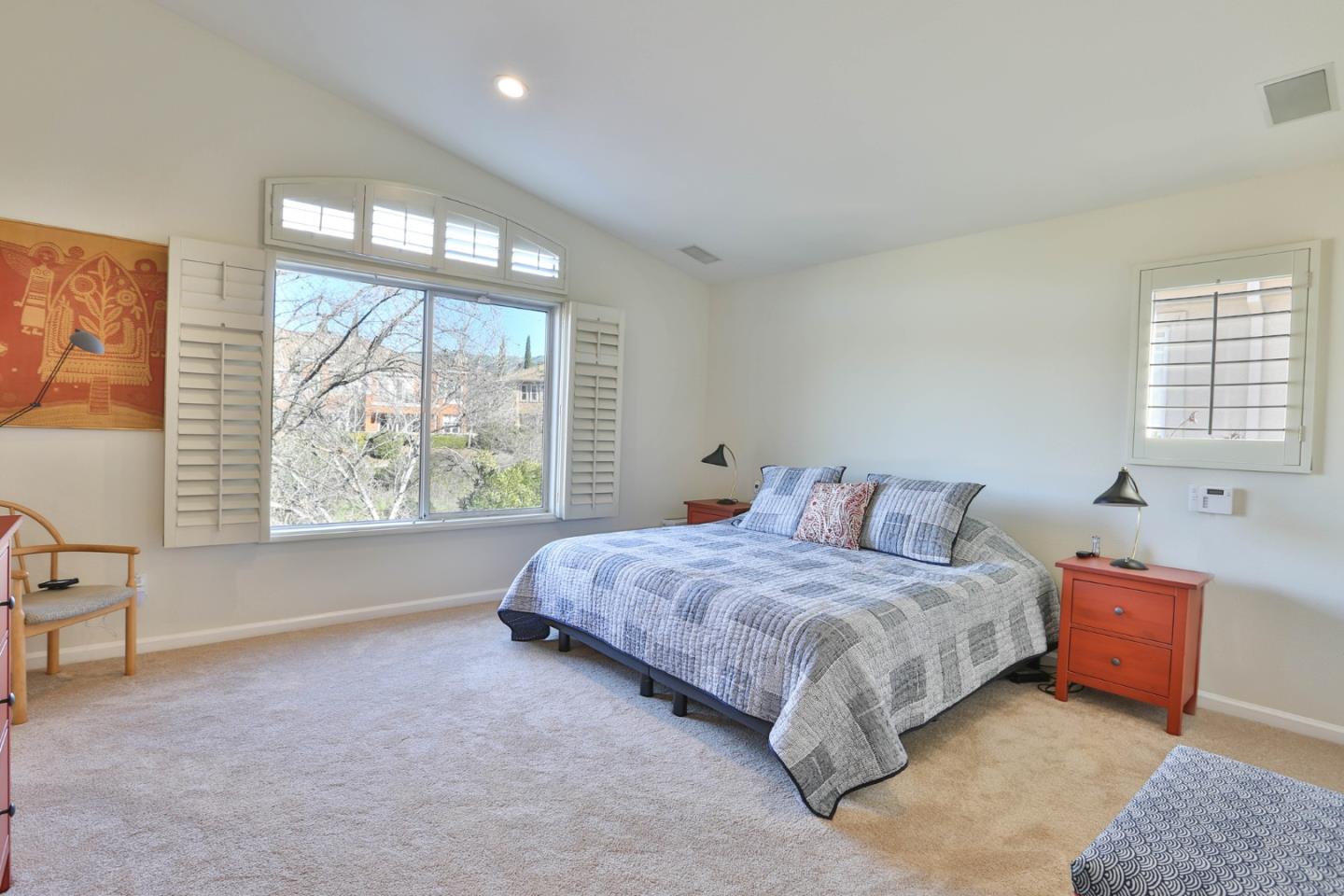 5409 Manderston Drive San Jose, CA 95138 - Photo 18 of 40 a spacious bedroom with a bed and a large window