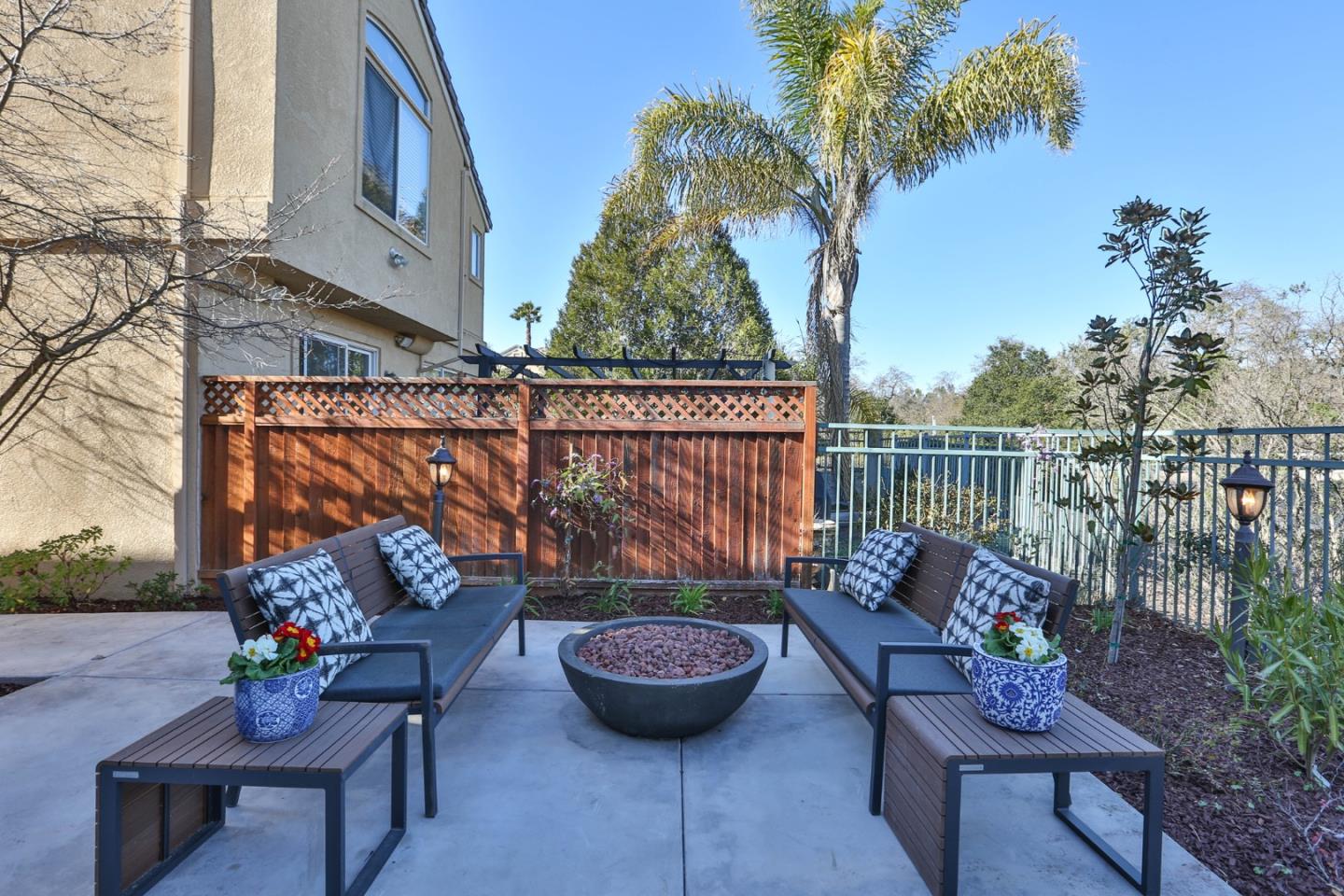 5409 Manderston Drive San Jose, CA 95138 - Photo 25 of 40 a view of a balcony with chairs and a potted plant