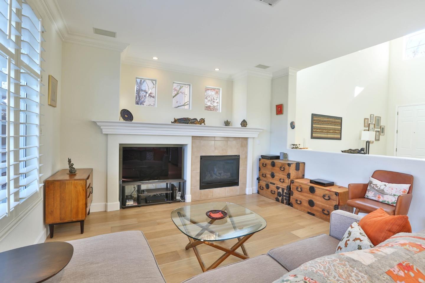 5409 Manderston Drive San Jose, CA 95138 - Photo 8 of 40 a living room with furniture and a fireplace