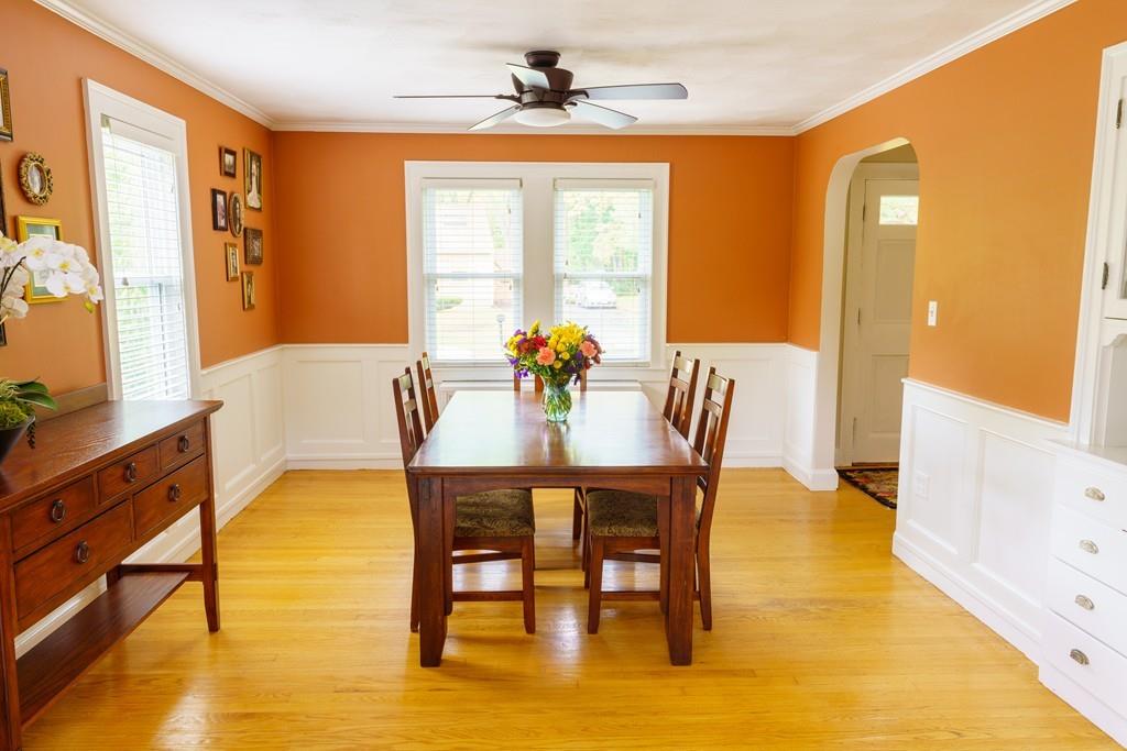 3 Wheelock Road Wayland, MA 01778 - Photo 3 of 10 a view of a dining room with furniture and a window