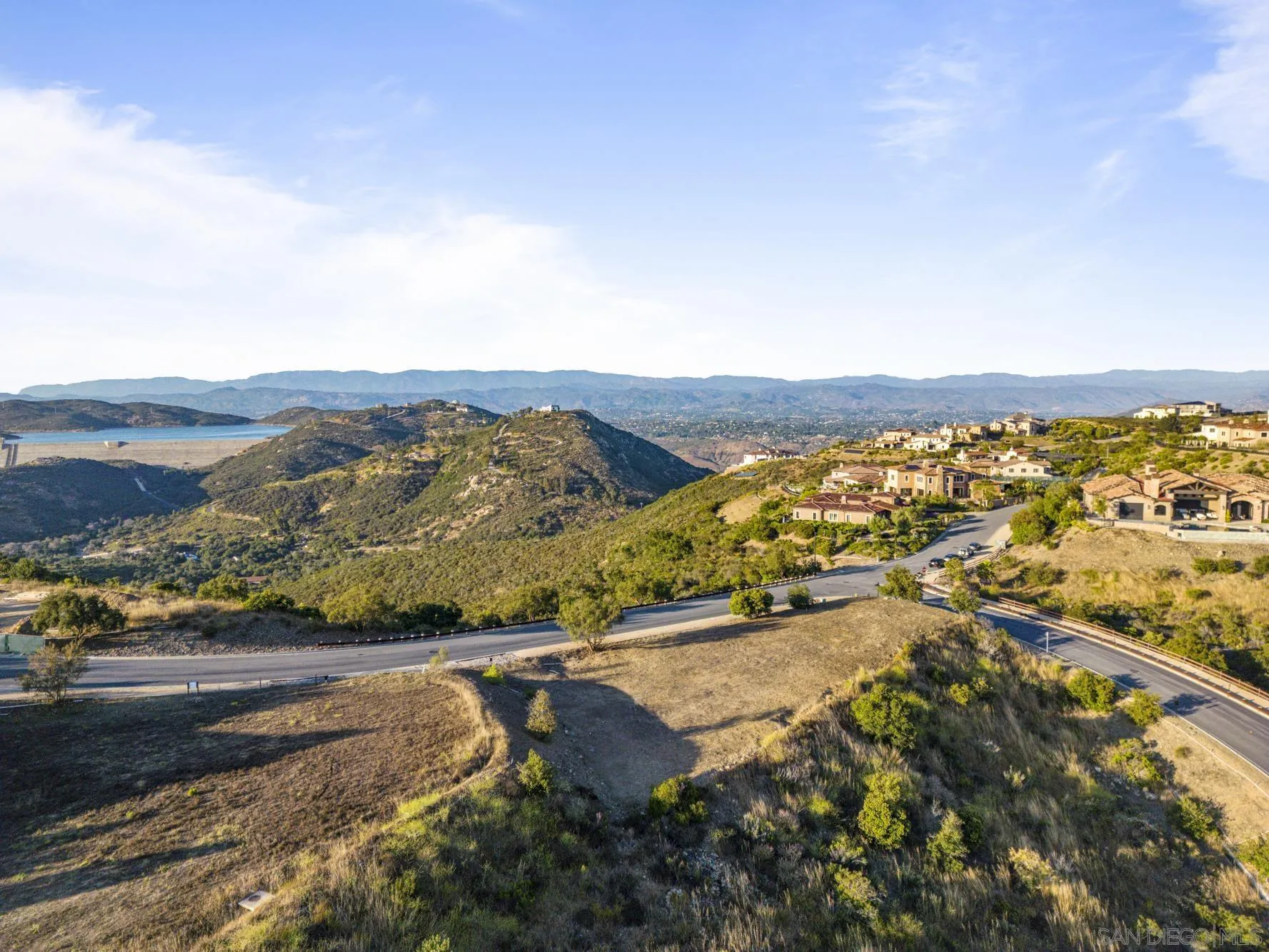 Via Rancho Cielo, Unit 6 Rancho Santa Fe, CA 92067 - Photo 3 of 16 an aerial view of residential houses with outdoor space and trees