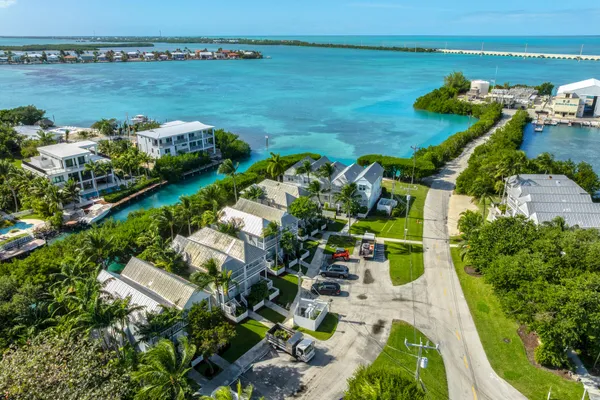 a view of a lake with a yard