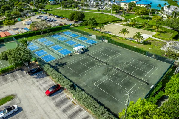 an aerial view of a house with a garden and plants