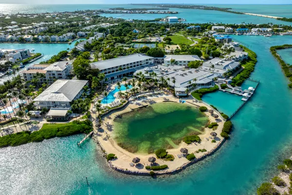 an aerial view of a house with outdoor space