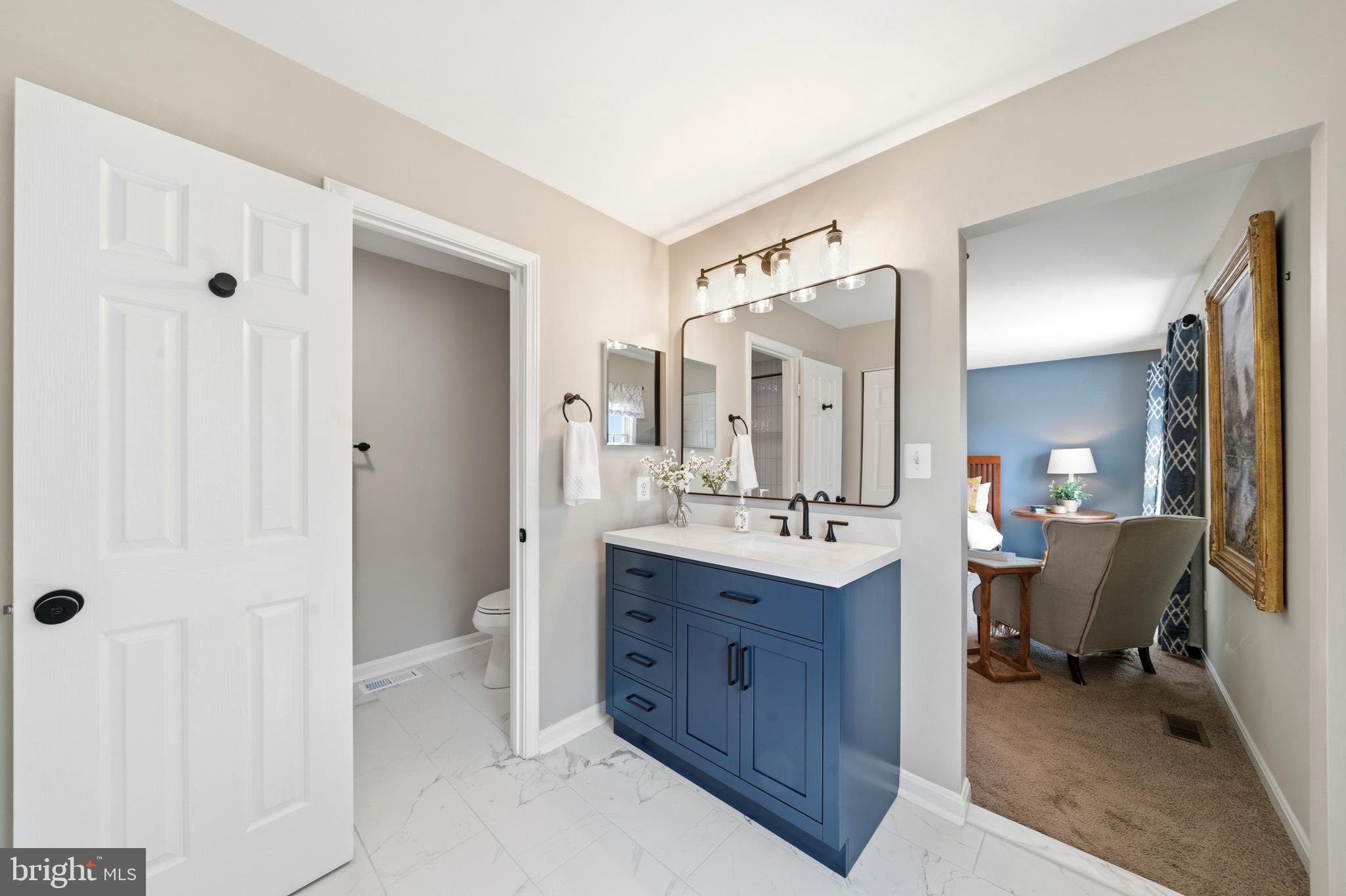 21031 Clarksburg Road Boyds, MD 20841 - Photo 25 of 79 Attached primary bath is freshly remodeled