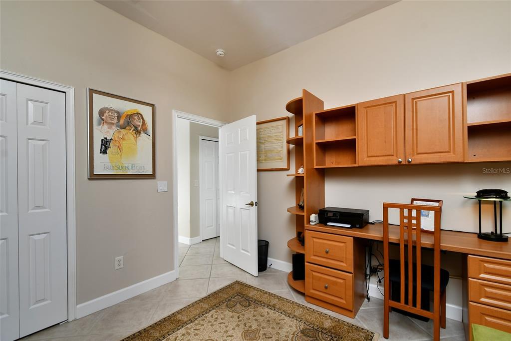 3454 Sunset Key Circle, Unit 103 Punta Gorda, FL 33955 - Photo 13 of 37 a view of kitchen with furniture and wooden floor