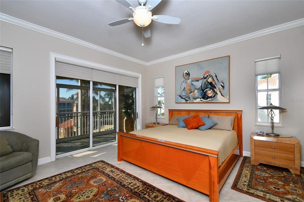 3454 Sunset Key Circle, Unit 103 Punta Gorda, FL 33955 - Photo 16 of 37 a bedroom with furniture and window