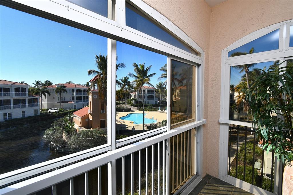 3454 Sunset Key Circle, Unit 103 Punta Gorda, FL 33955 - Photo 18 of 37 a view of a street from a balcony