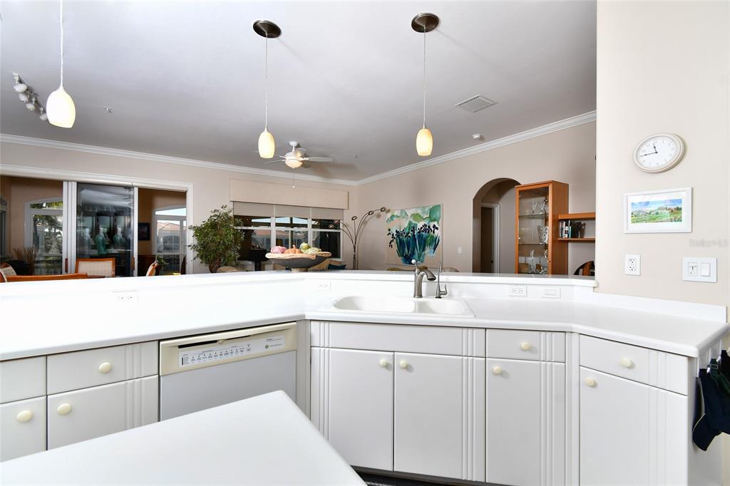 3454 Sunset Key Circle, Unit 103 Punta Gorda, FL 33955 - Photo 25 of 37 a bathroom with a sink and mirror
