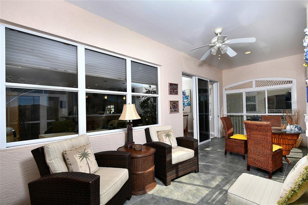 3454 Sunset Key Circle, Unit 103 Punta Gorda, FL 33955 - Photo 33 of 37 a living room with furniture and window