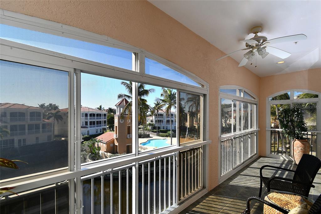 3454 Sunset Key Circle, Unit 103 Punta Gorda, FL 33955 - Photo 34 of 37 a view of a balcony with furniture