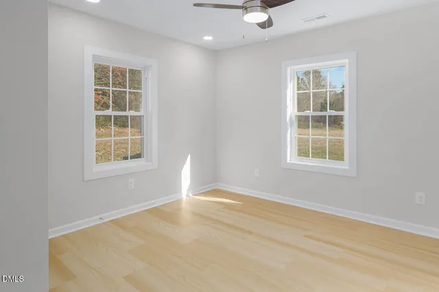 an empty room with windows