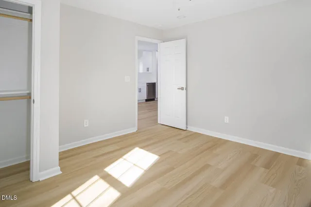 a view of an empty room and window