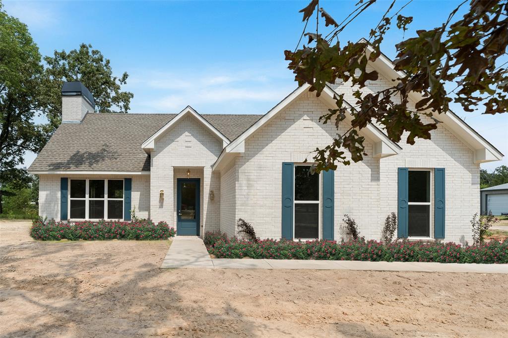 322 Rs Co Road Alba, TX 75410 - Photo 1 of 37 Roses in the photo are a visual representation and not physically present on the property.