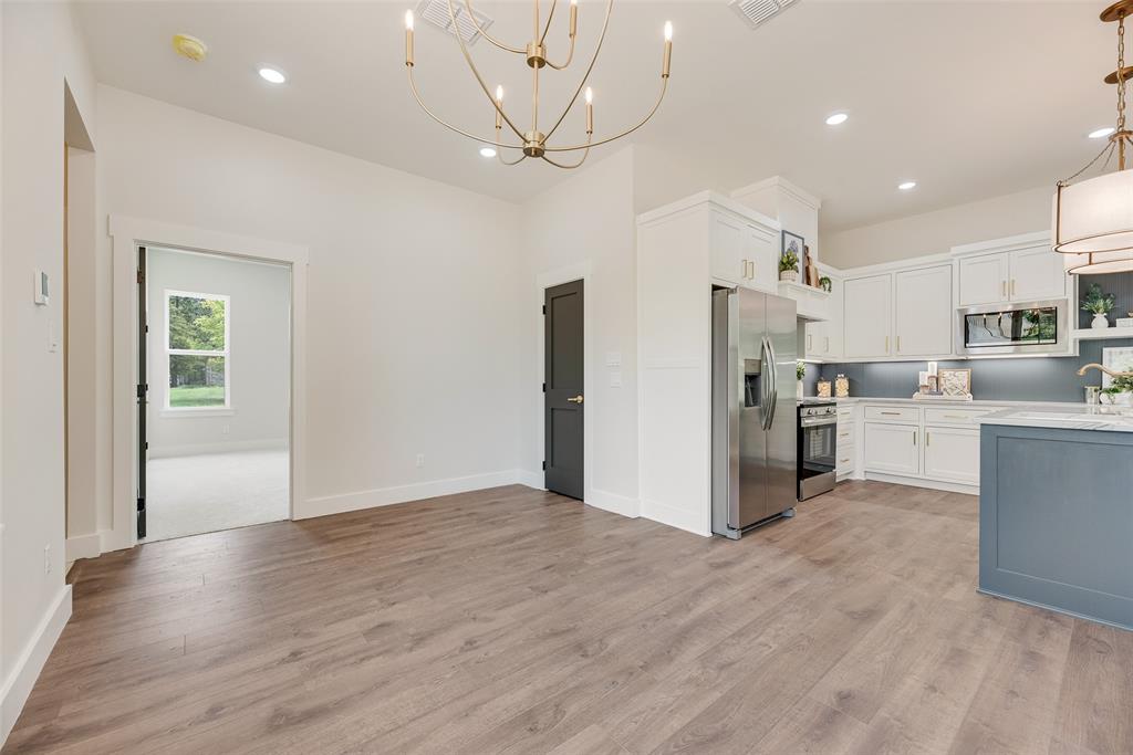 322 Rs Co Road Alba, TX 75410 - Photo 13 of 37 Kitchen with open shelves, white cabinets, stainless steel appliances, light wood-type flooring, and recessed lighting