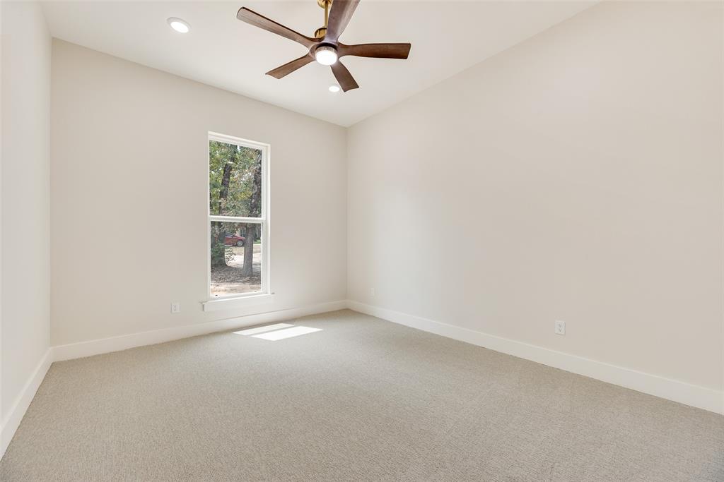 322 Rs Co Road Alba, TX 75410 - Photo 24 of 37 Spare room featuring light colored carpet, recessed lighting, and a ceiling fan