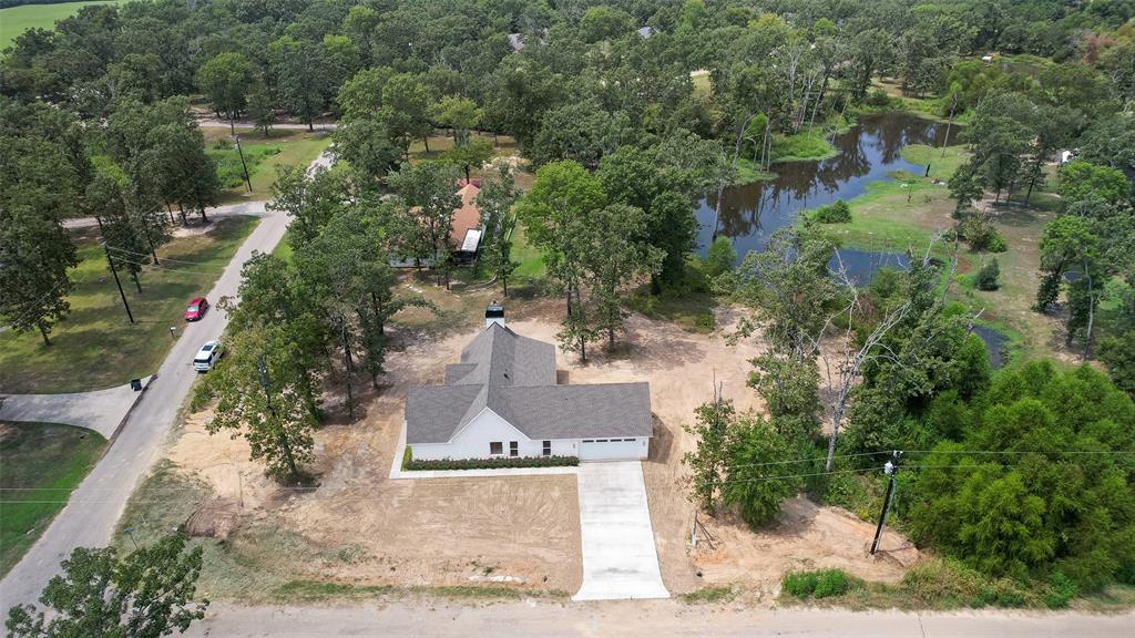 322 Rs Co Road Alba, TX 75410 - Photo 33 of 37 Aerial view of property and surrounding area with a nearby body of water
