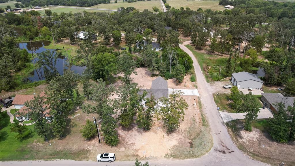 322 Rs Co Road Alba, TX 75410 - Photo 34 of 37 Aerial overview of property's location featuring a nearby body of water and a tree filled landscape