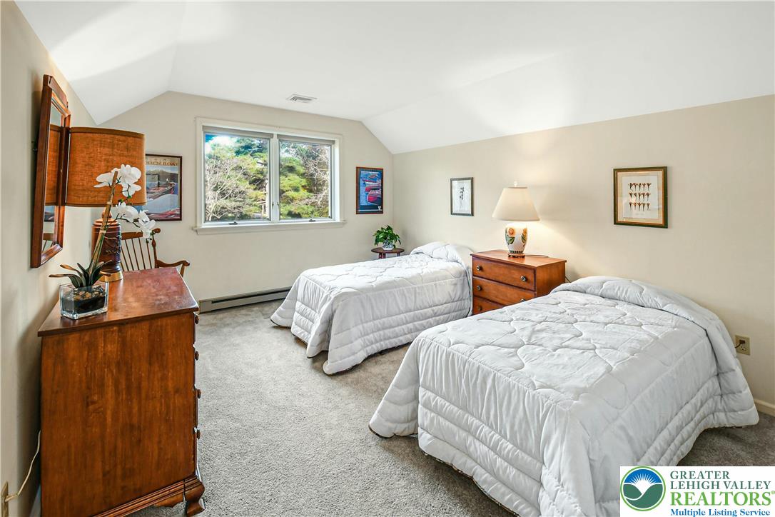 1588 Saucon Valley Road Bethlehem, PA 18015 - Photo 23 of 35 a bedroom with two beds and painting on the wall