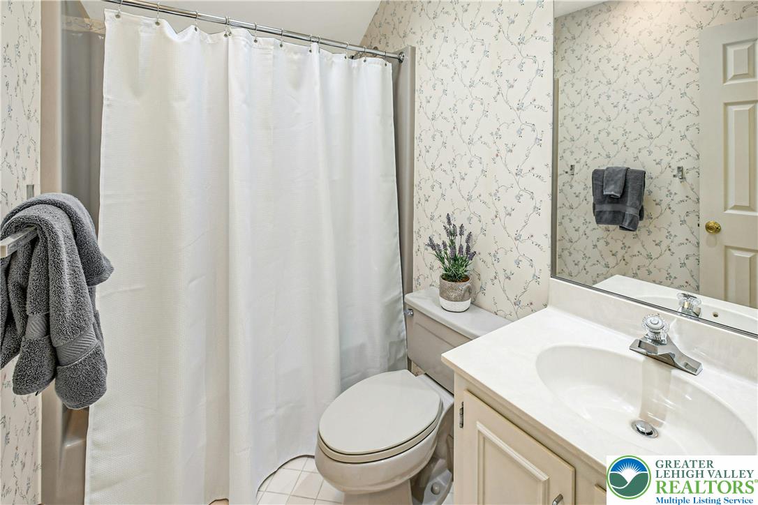 1588 Saucon Valley Road Bethlehem, PA 18015 - Photo 24 of 35 a bathroom with a sink toilet and shower