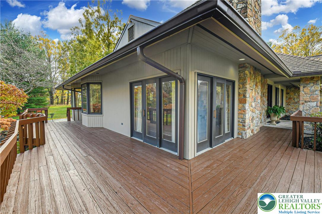 1588 Saucon Valley Road Bethlehem, PA 18015 - Photo 27 of 35 a view of backyard with a deck and wooden floor