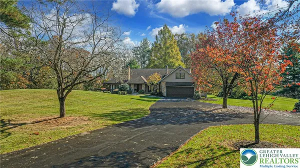 a house view with a garden space