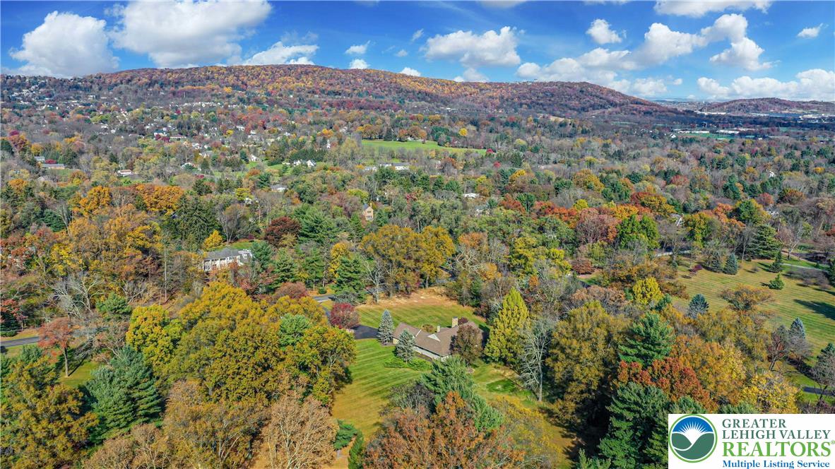 1588 Saucon Valley Road Bethlehem, PA 18015 - Photo 34 of 35 a view of a dry yard with mountains in the background