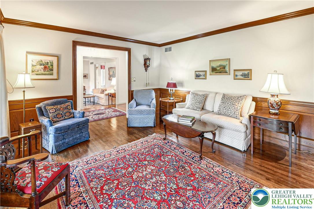 1588 Saucon Valley Road Bethlehem, PA 18015 - Photo 8 of 35 a living room with furniture and a rug