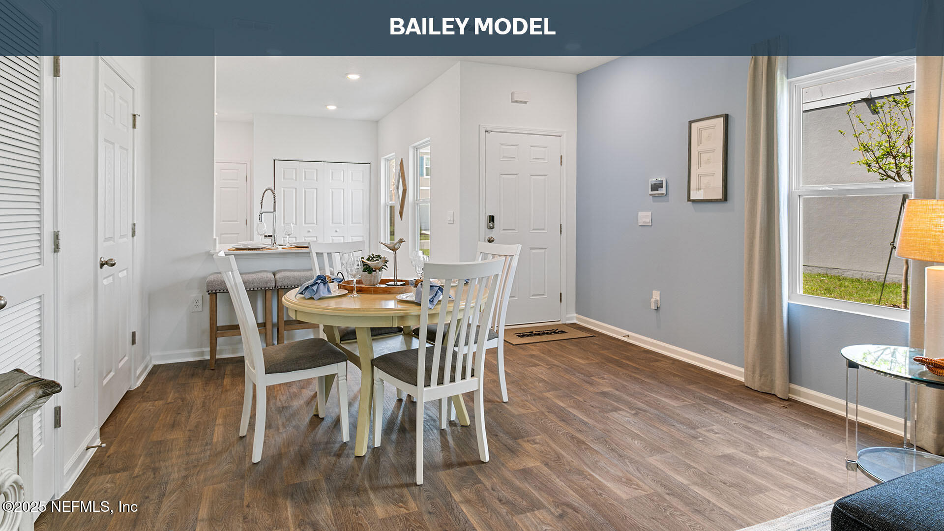 275 Counsel Street Yulee, FL 32097 - Photo 8 of 20 a view of a dining room with furniture and wooden floor