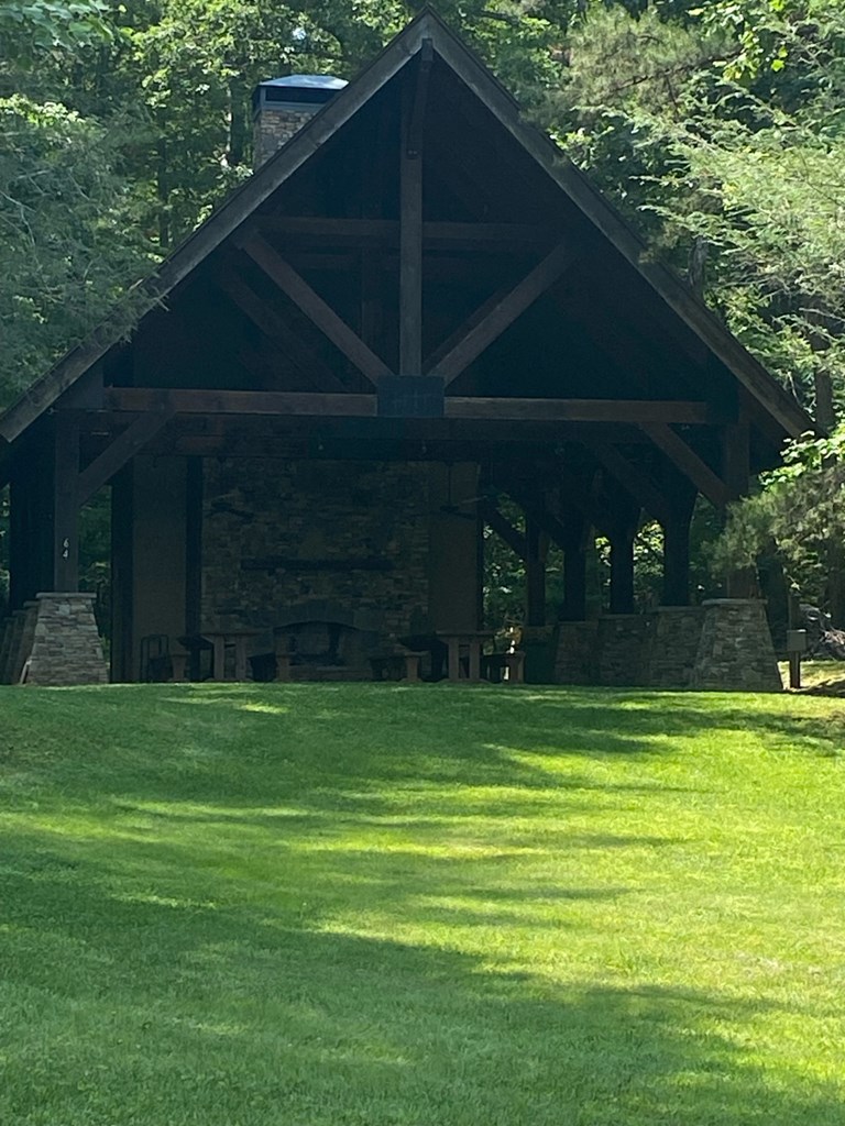 Lot 34 Point Overlook Trail Murphy, NC 28906 - Photo 15 of 17 a backyard of a house with lots of green space