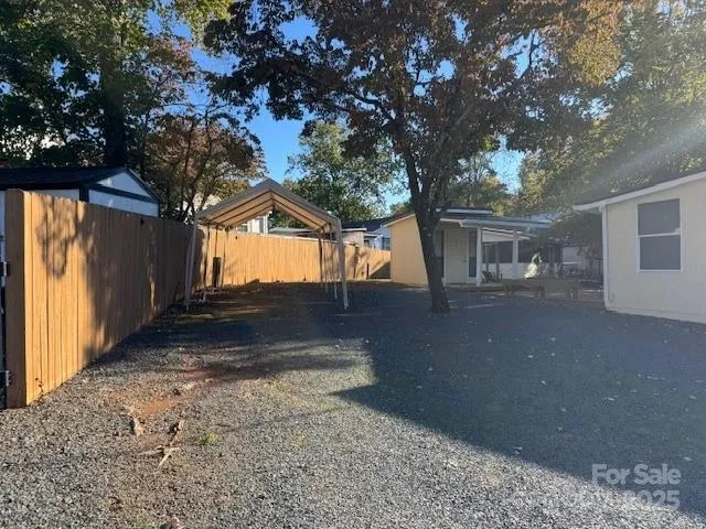 a view of street with parked cars