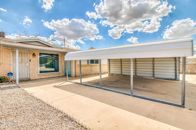front view of a house with a patio