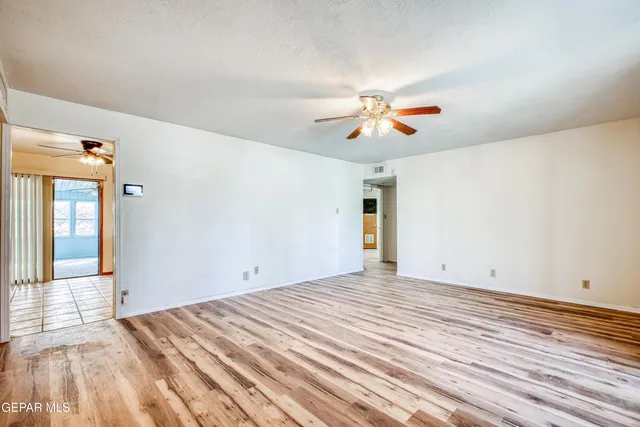 a kitchen with stainless steel appliances a sink and cabinets