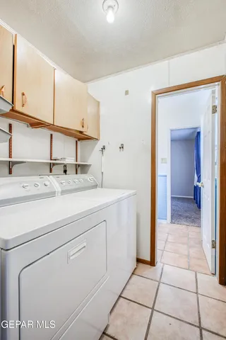 a kitchen with stainless steel appliances granite countertop a sink and a cabinets