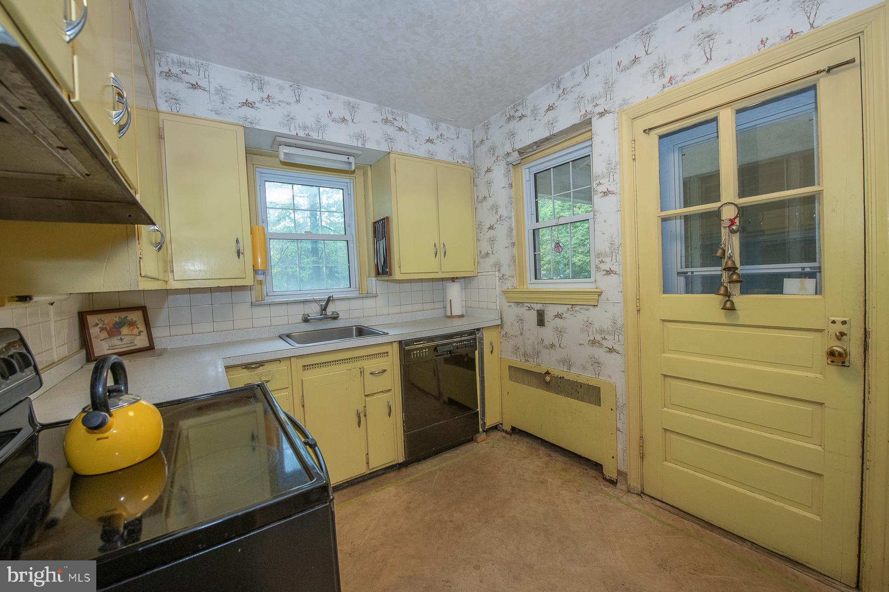 826 West King Road Malvern, PA 19355 - Photo 20 of 43 Kitchen...access to the side yard.