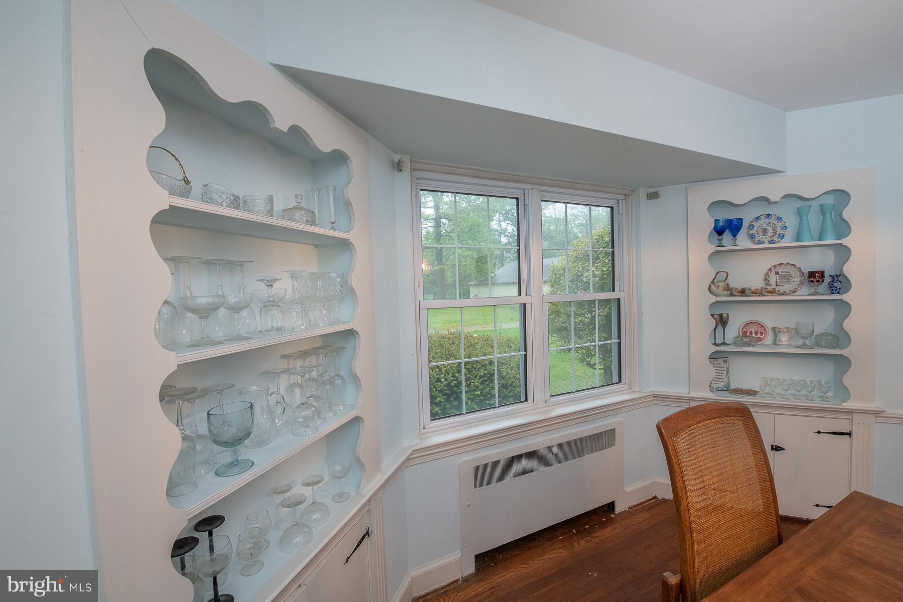 826 West King Road Malvern, PA 19355 - Photo 26 of 43 Corner display cabinets, well lit Dining Rm.