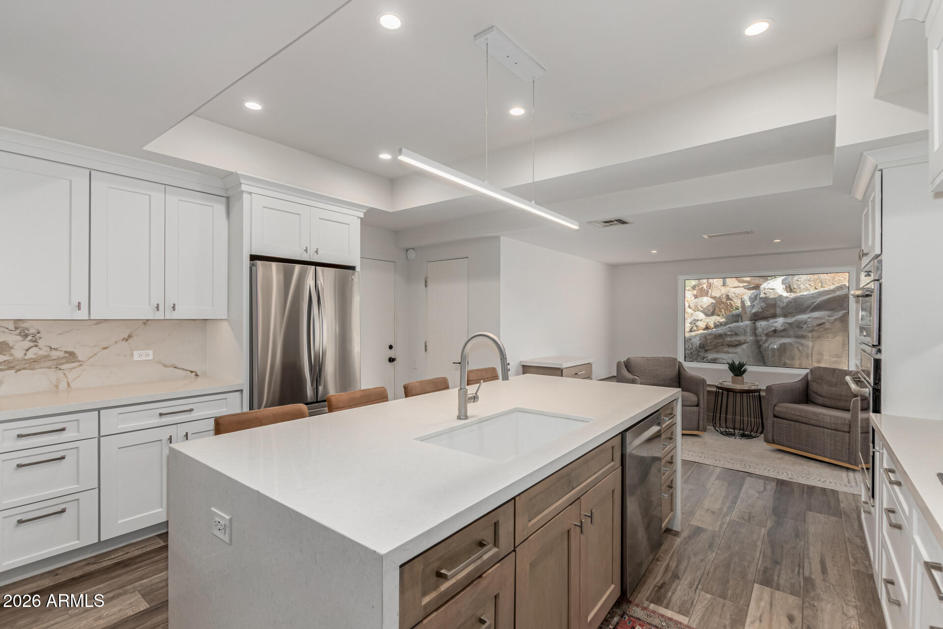 3001 Ironwood Road Carefree, AZ 85377 - Photo 14 of 31 a kitchen that has a sink a stove and a refrigerator
