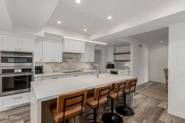 a bedroom with double bed and a window