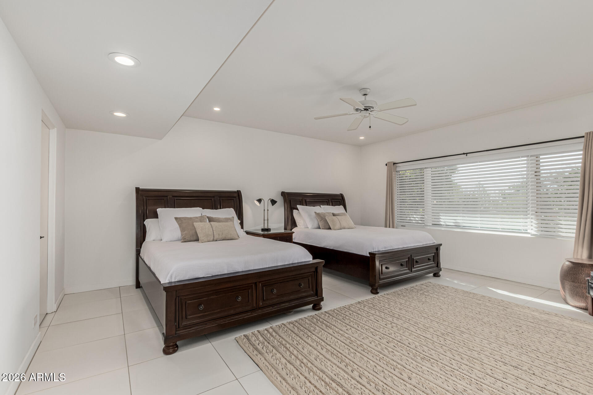 3001 Ironwood Road Carefree, AZ 85377 - Photo 17 of 31 a bedroom with double bed and a window