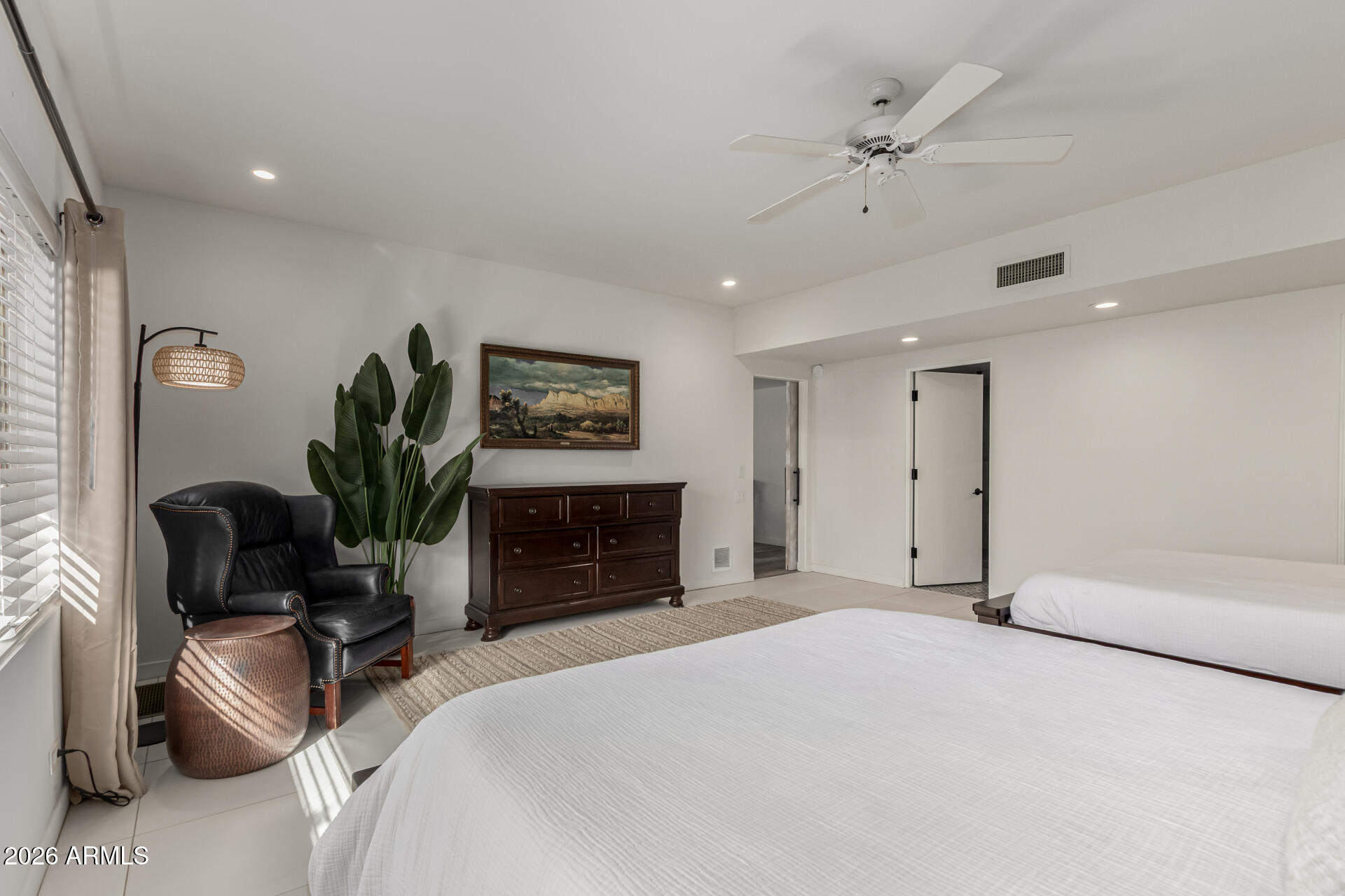 3001 Ironwood Road Carefree, AZ 85377 - Photo 18 of 31 a bedroom with furniture and a fireplace