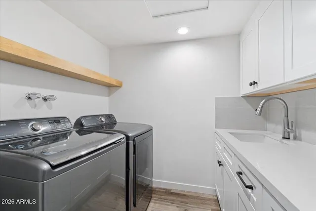 a view of a swimming pool with a lounge chairs